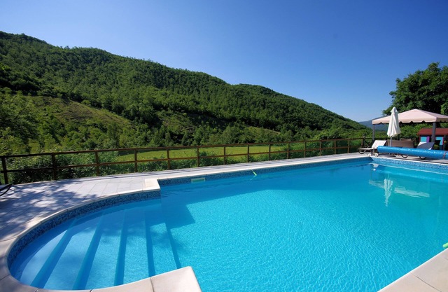 Rancale-Beautiful and Imposing Stone Farmhouse with Pool in Quiet Valley Setting