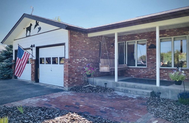 Ranch-style home with horse property and fenced yard