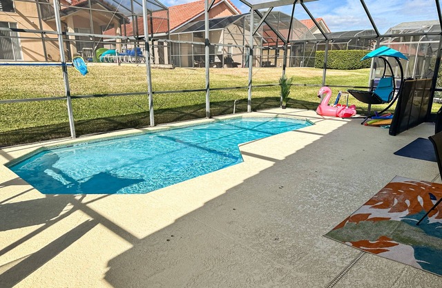 Remodeled Solana Resort home with enclosed pool, game room, & gym - dog-friendly
