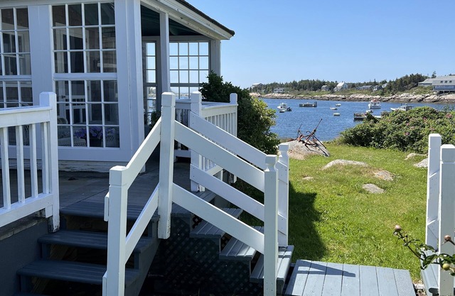 Remote Maine island cottage with harbor and ocean side views