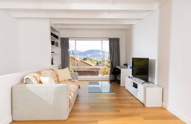 Renovated two-level Sandy Bay apartment