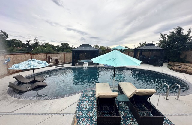 Retreat at our Oasis with year round salt water pool and hot tub.
