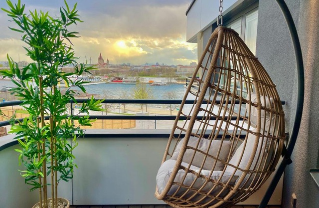 Riverfront Apartment with Balcony & AC