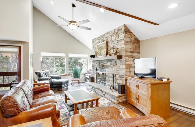 Riverfront retreat w/private balcony, shared pool, tennis courts, & free WiFi