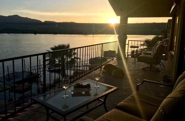 Riverfront w/lawn, jet ski dock, and boat dock. Views and spectacular Sunsets!