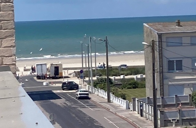 Roof top lighthouse and sea view