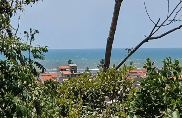 Rosi Hill: Bangalô com piscina e vista para o mar