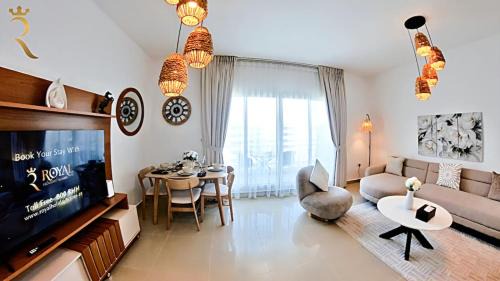 Roxen Retreat 1BR - Comfortable Poolside Living Near Al Reef Beach