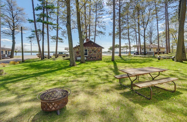 Rustic Cabin w/Fire Pit, Steps to Sand Lake!