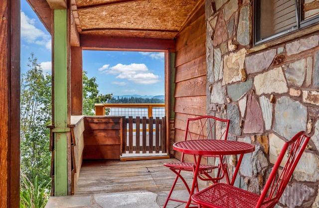 Rustic lakeview cabin w/gas grill, large deck, mountain views, W/D, wood stove