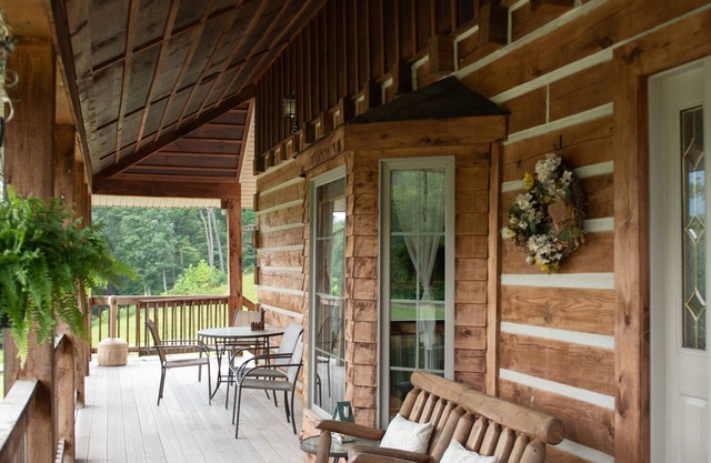 Rustic Log Lodge Overlooking Water and Mountain Views