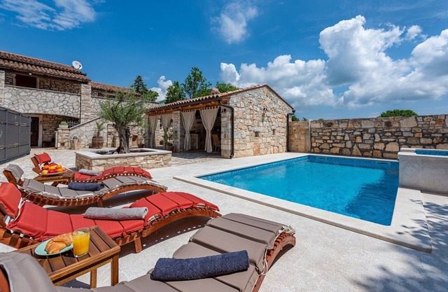 Rustic stone holiday house with pool