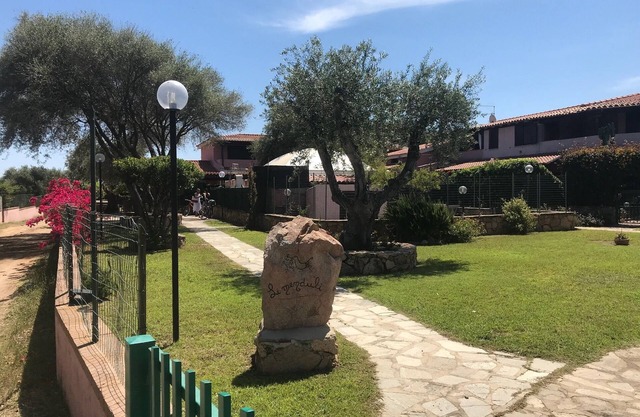 'San Teodoro Holiday House A' with Wi-Fi, A/C & Terrace