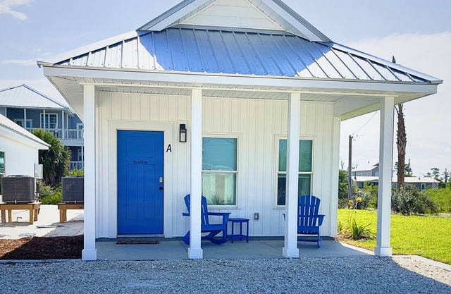 "Scallop Cottage" is a pet friendly, 2 bed, 1 1/2 bath unit accepting 5 guests. Pool Coming 2025!