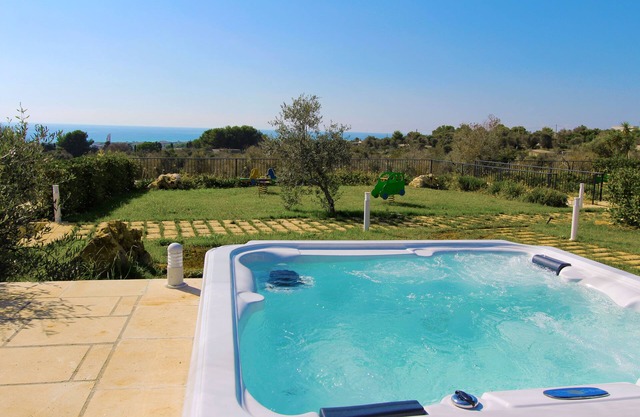 Sea view villa with garden and private hot tub 243