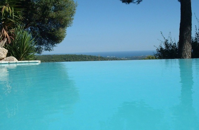 Sea views from the pool and from every room at Villa 'Pura Vida'!
