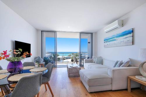 Seascape Haven - Elegant Beachside Living with Pool