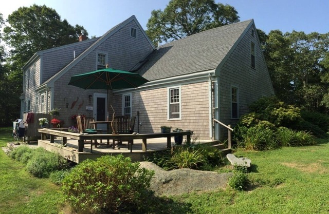 Secluded house in the woods with deck, streamside firepit, Vincent Beach nearby