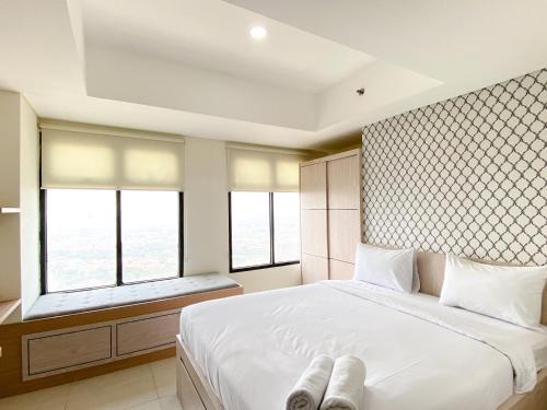 Simply Look Studio at Pollux Chadstone Apartment By Travelio