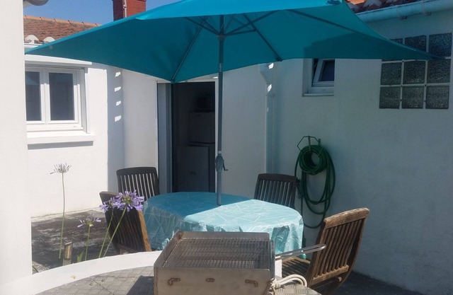 Small fisherman's house near train station and beach