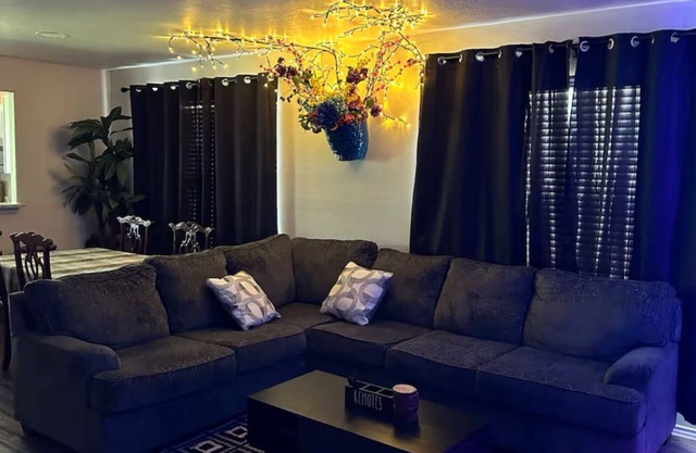 Spacious 4-bedroom house, 2 living rooms. Huge backyard WiFi, AC, fitness room