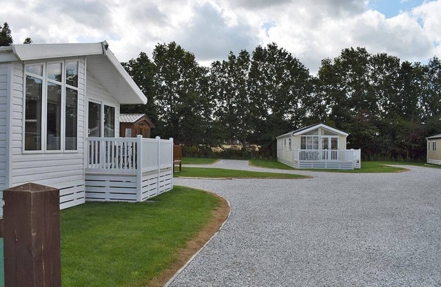 Spacious, modern lodge with two doubles and one twin.
