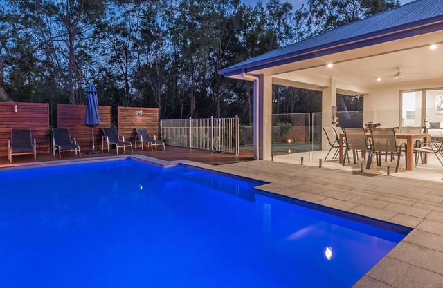 Spacious Resort Style Home with Solar Heated Pool, Huge Outdoor Patio with TV