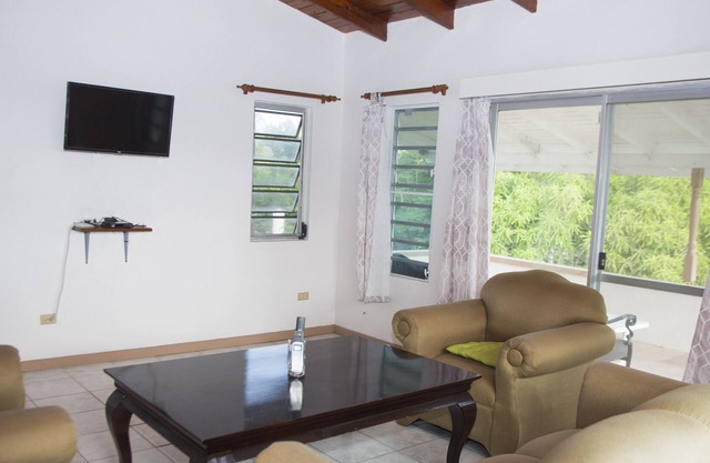 Spacious villa in mature gardens, near beaches, shops and reputable schools.