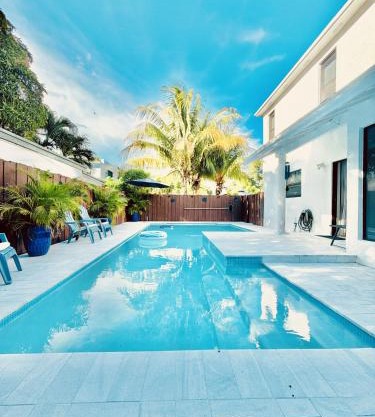 Stay Central: Relax in Our Heated Pool Oasis