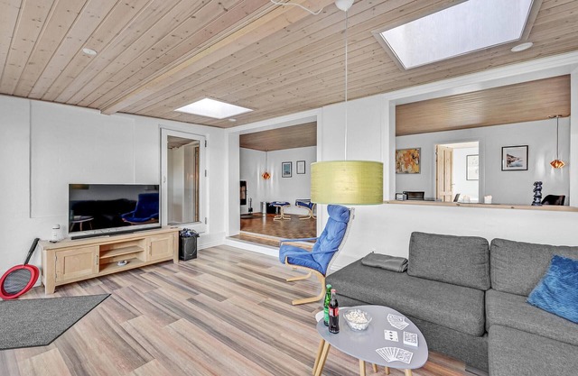 Step into a spacious and open vacation home in the west of Denmark.