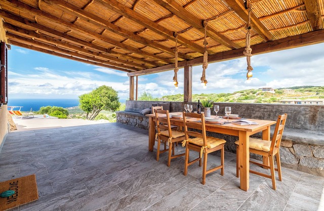 Studio Apartment 'Sa Domo Isola Rossa' with Sea View, Private Terrace and Air Conditioning
