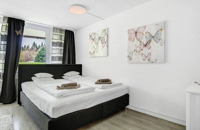 Studio Apartment "Schmetterling" near Slopes with Shared Pool & Wi-Fi