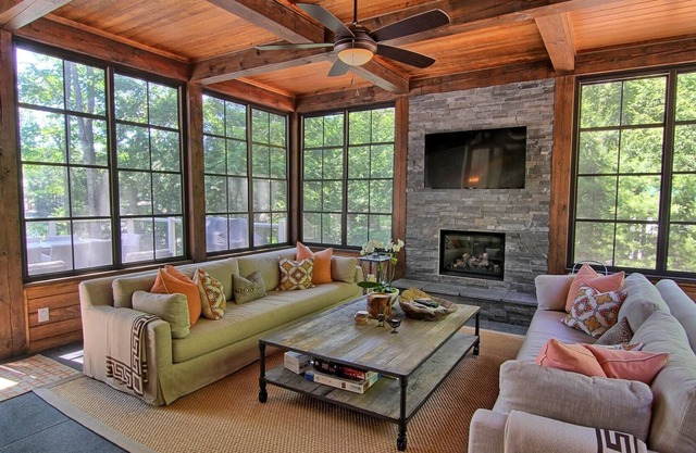 Stunning Cottage on Lake Joe! 6 bdrm,6 bath,2 slip boathouse! Water Toys Galore!
