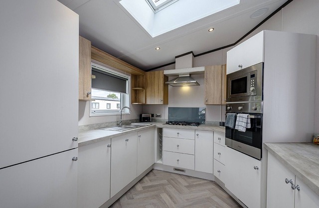 Stunning Lodge with one double with ensuite shower and one twin.