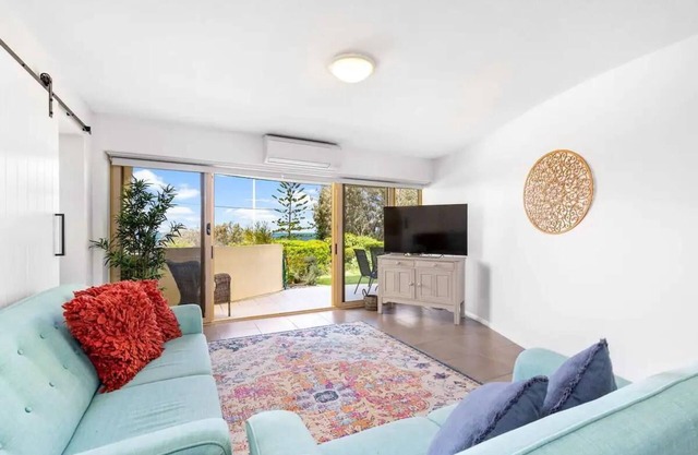 Stunning Oceanfront Apartment. Enjoy the ocean breeze, pool and private garden.