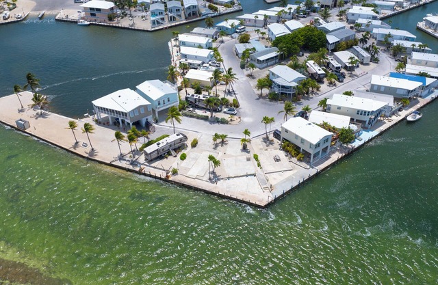 Stunning Open Water RV Lot with 38' Seawall and Great Amenities in Gated Community
