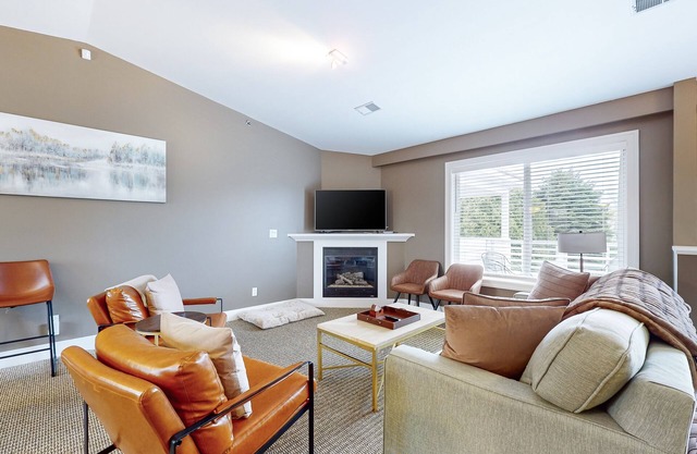Stylish dog-friendly retreat with furnished deck, pool, & firepits