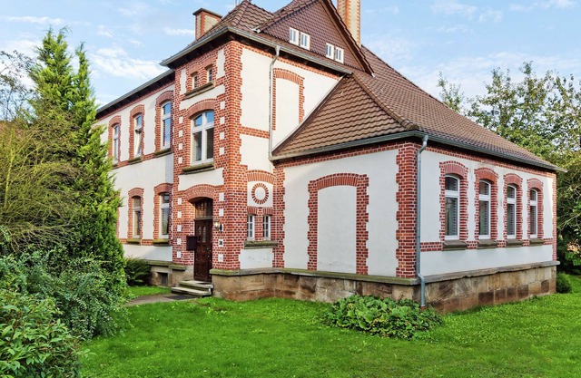 Stylish former village school with garden