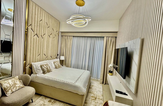 Stylish studio with large balcony & private parking in Azizi Riviera