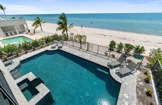 Sunset Beach | Modern, Luxury Beachfront Pool Home | Sleeps 12