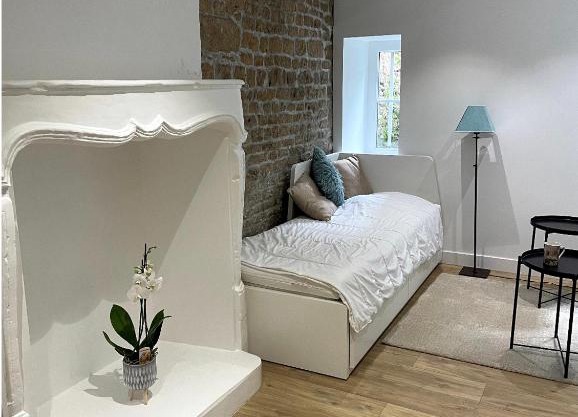 Superbe appartement avec accès patio