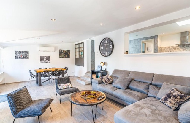 Superbe appartement avec terrasse sur les toits