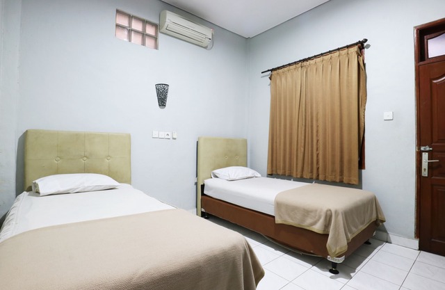 Oyo Taman Mekar Beach Inn 