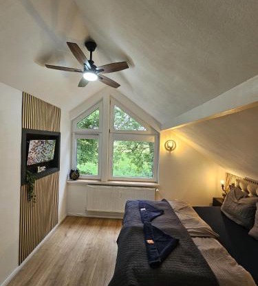 Tautraum Suite mit Whirlpool und grünem Ausblick