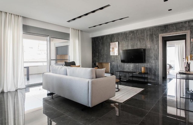 Teal Faliro House by UPSTREET