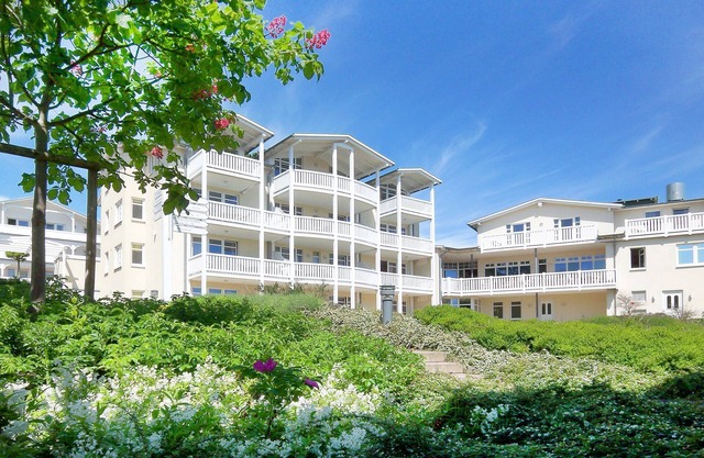 Terrace, free use of the AHOI adventure pool and sauna - Sea view apartment 43