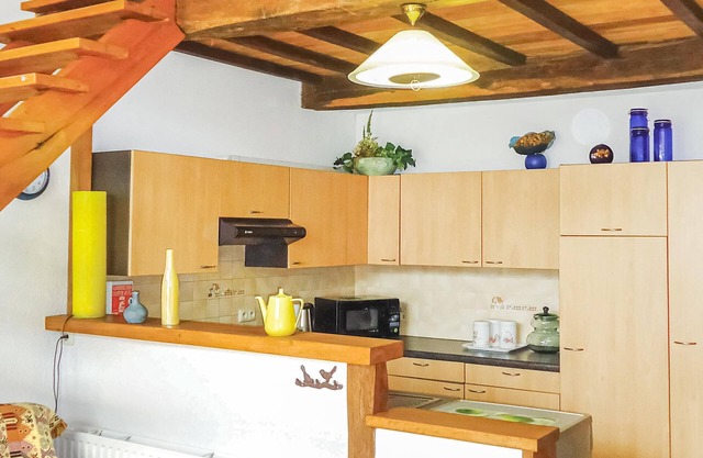 The building consists of this semi-detached house and additional 3 apartments.