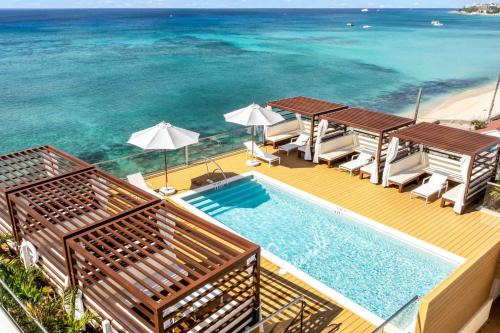 The Sands #1 - New 7Mile Beach Condo with Rooftop Pool & Luxe Interiors