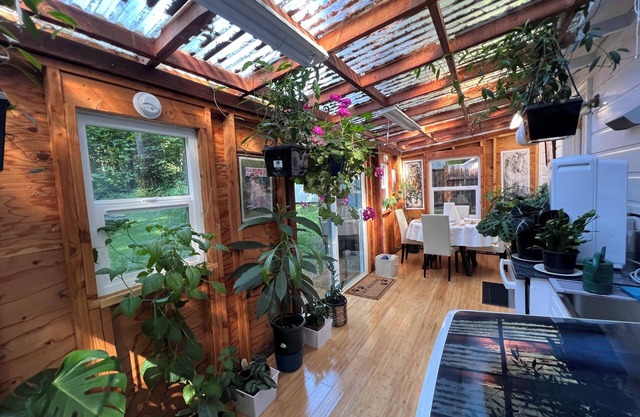 The Swisshome Nest 🌺 is in a beautiful forest🌴 setting 22 miles from the sea🌊