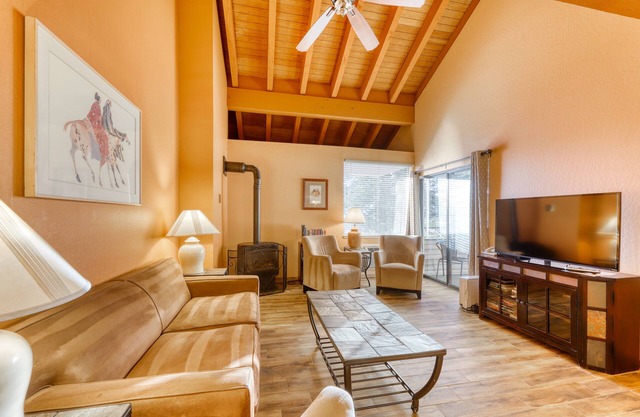 Third-floor condo with loft, hot tub, heated outdoor pool, WiFi, & fireplace